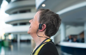 Woman wearing Emotiv headphones
